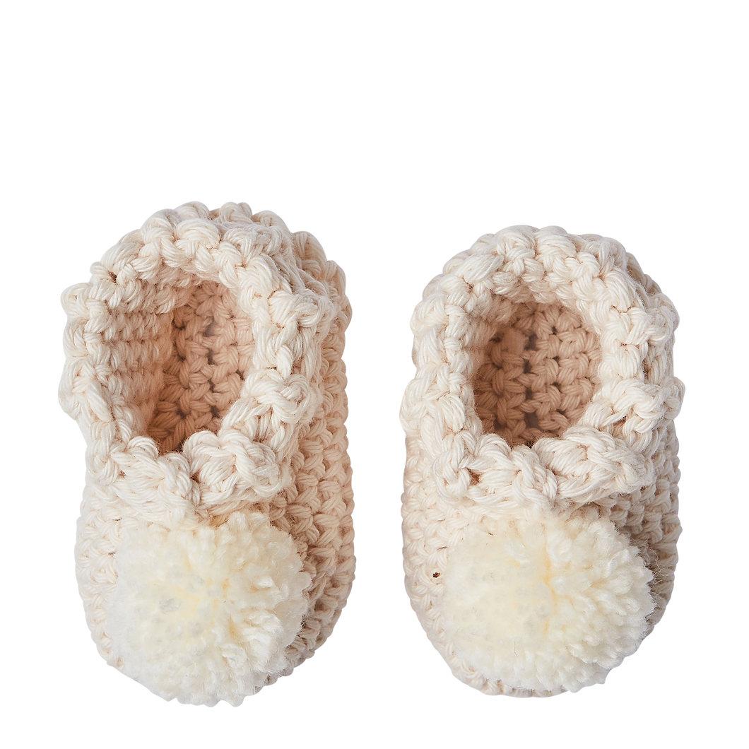Knitted baby booties. Parcel London